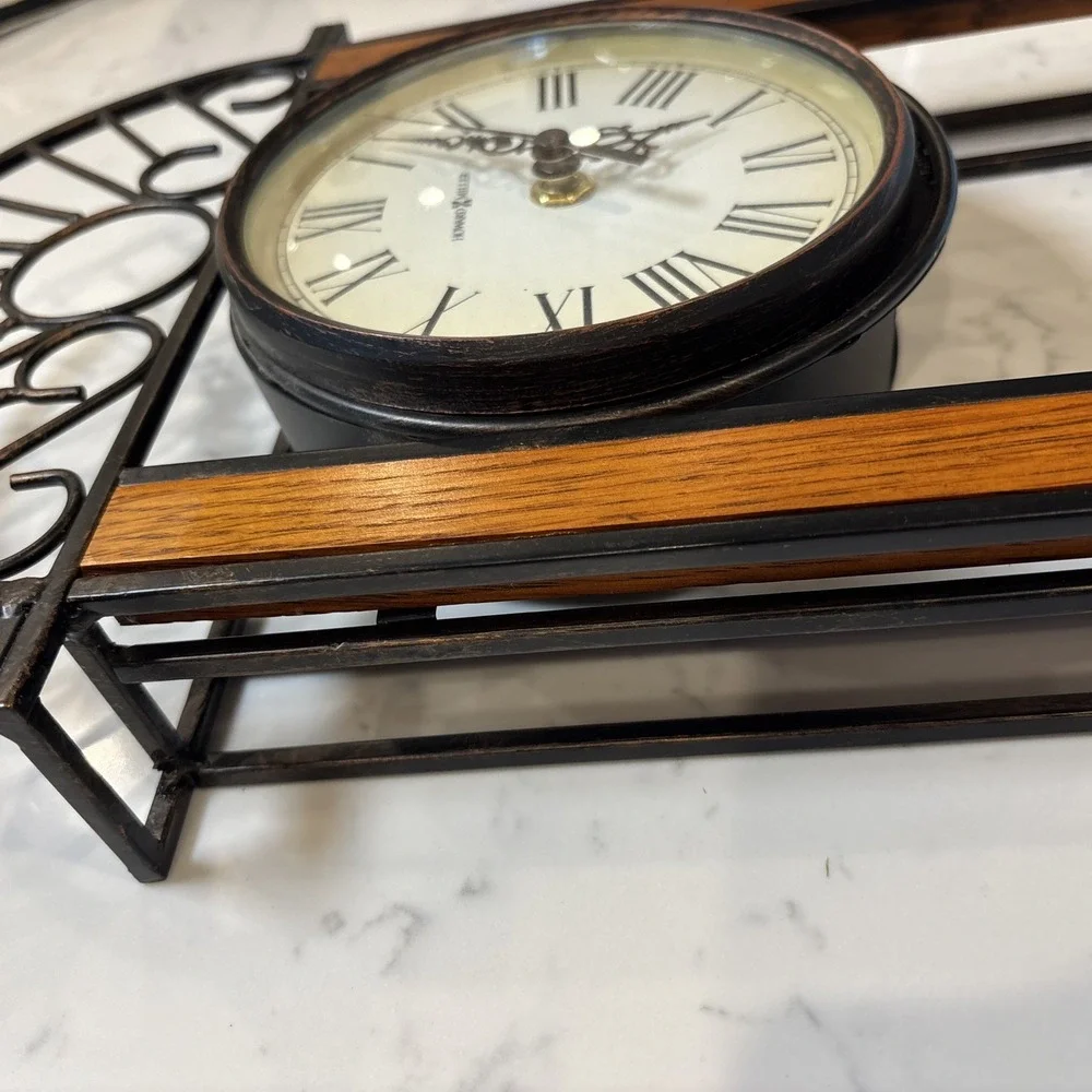Howard Miller Devahn Wall Clock Antique Bronze Wrought Iron Roman Numeral 625241